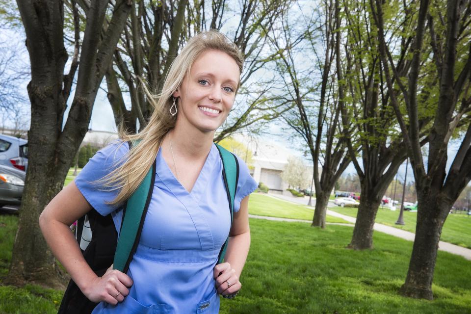 LPN student with backpack