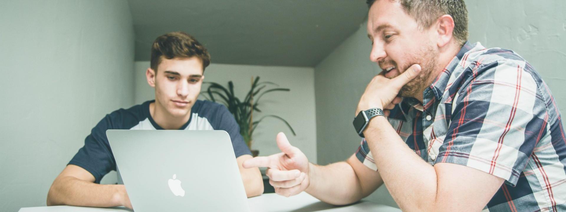 Parent with student at computer