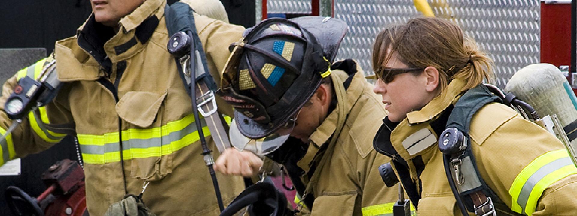 3 firefighters in protective gear