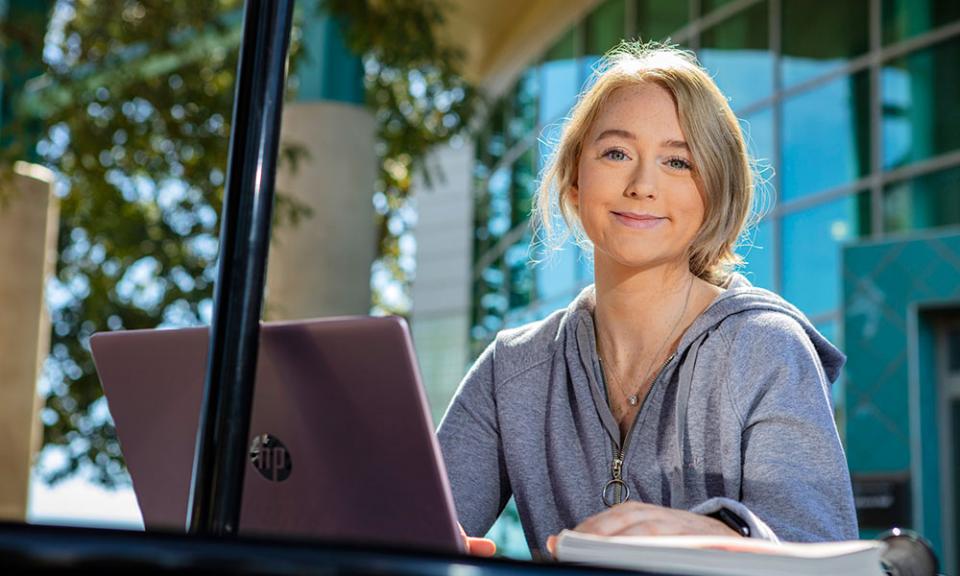 Girl sitting at computer