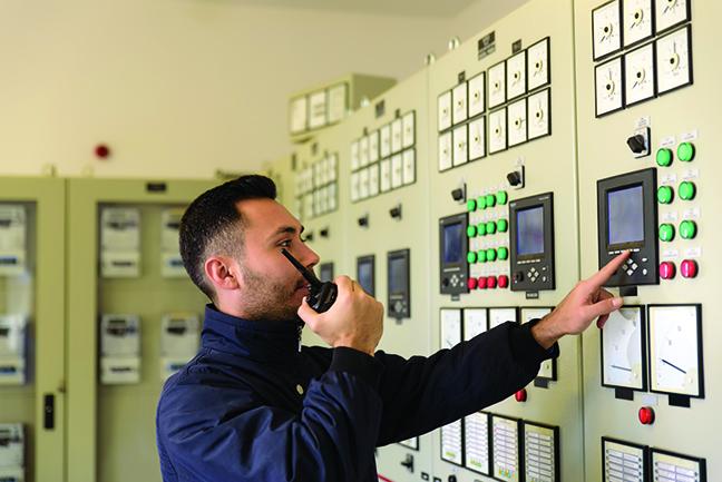 A student at an electrical panel