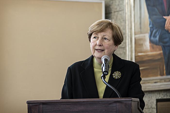A woman speaking at the groundbreaking ceremony