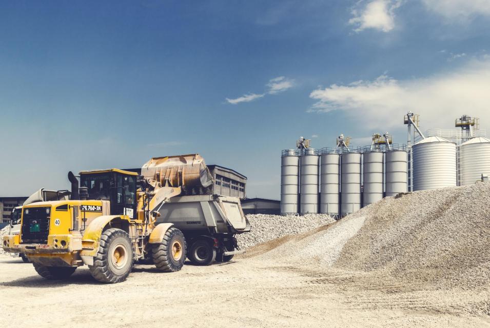 Photo of construction equipment moving rock/dirt around