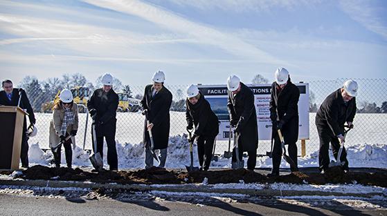 People breaking ground on a new building