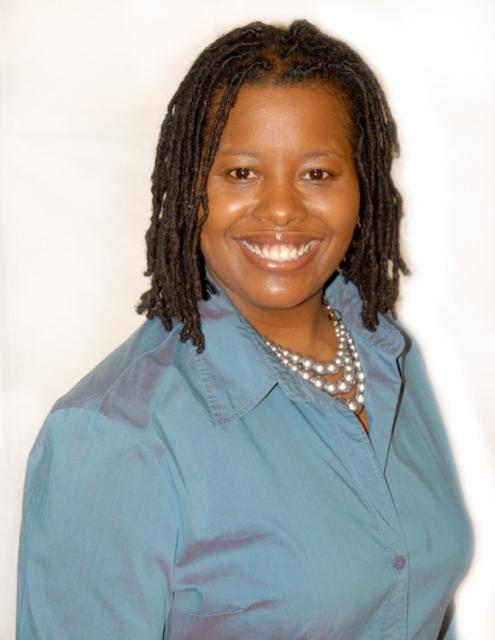 J. Love Benton, african-american woman,  smiling at camera