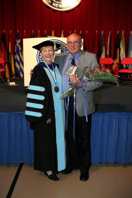 James Woolard stands with COTC president Bonnie Coe. 