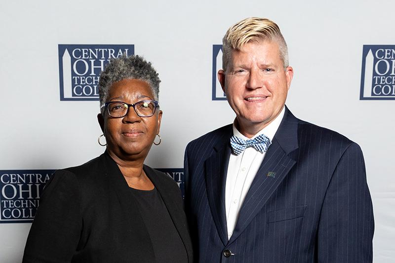 Portrait of Vorley Taylor standing next to John Berry