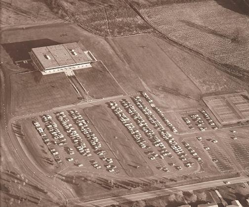 Aerial view of the Newark campus in 1971 showing the lone Founders Hall building and one parking lot.