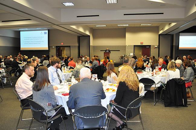 People eating at the scholarship breakfast