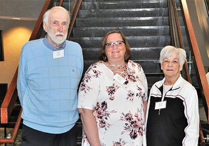 Three people posing at the Scholarship Breakfast