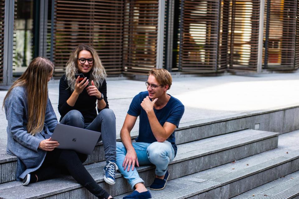 3 students talking