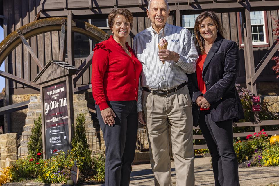 Luconda, Joanne and Joe Dager stand outside Velvet Ice Cream's headquarters in Utica.