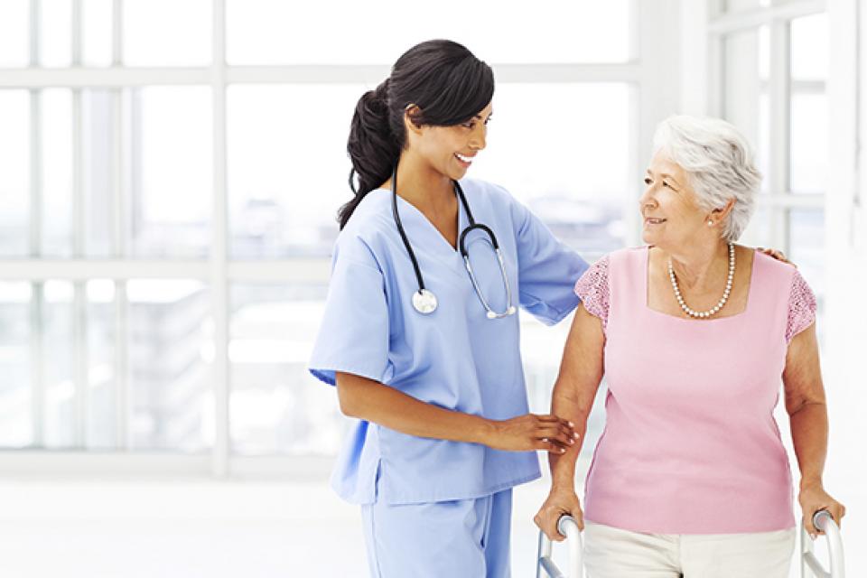 Health Services Technology student with patient