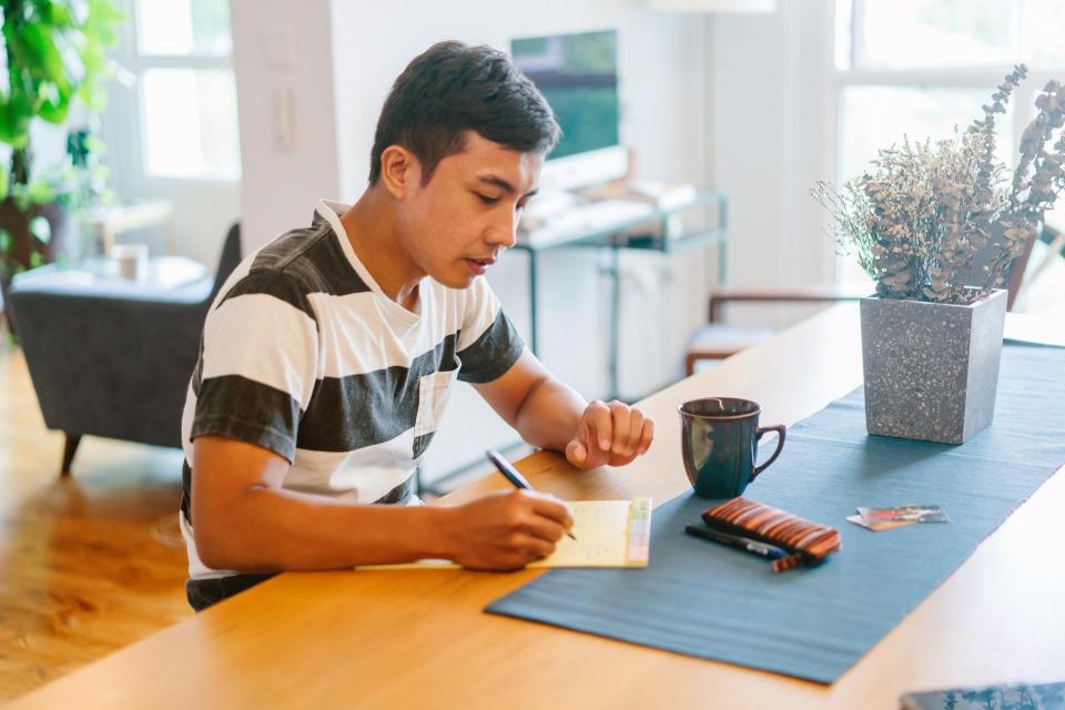 student filling out paperwork