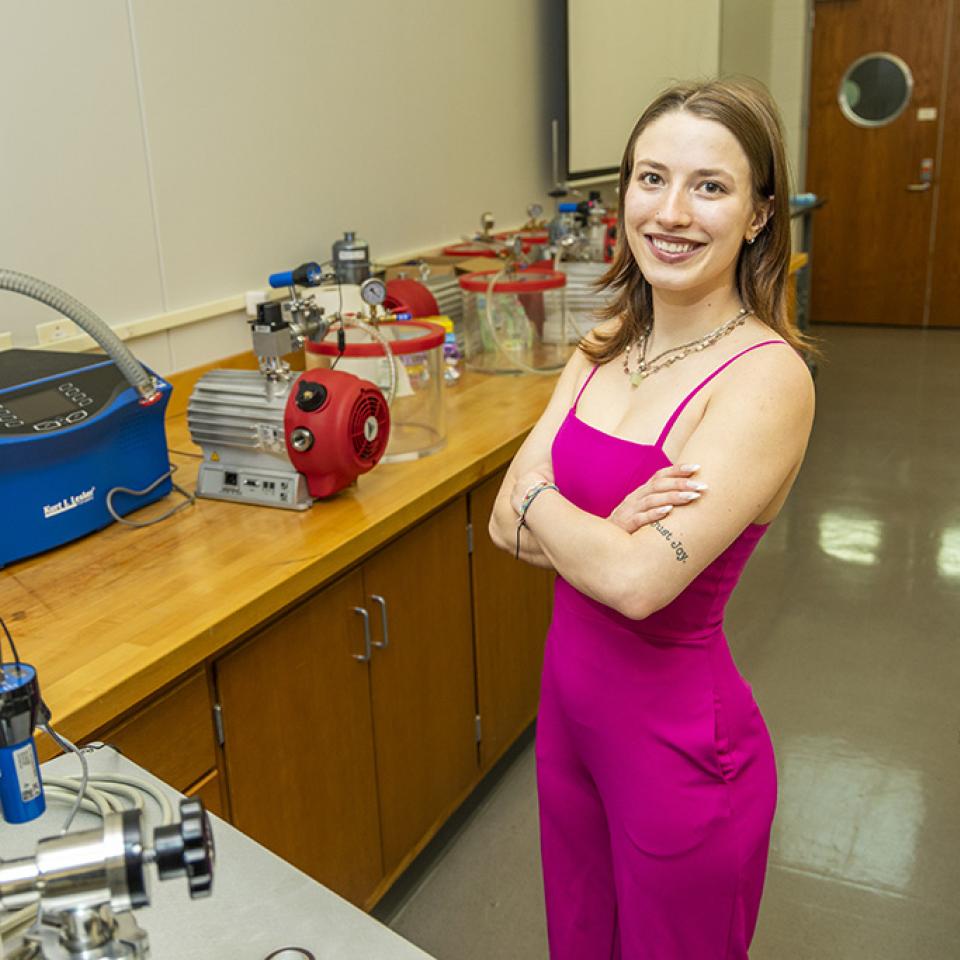 Portrait of Zenna Stirling inside an engineering technology lab.