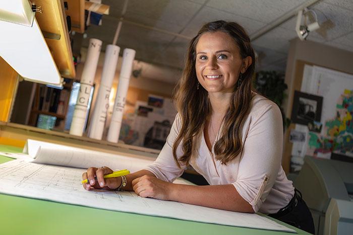 woman at a drafting table