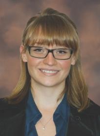 Young white female smiling at camera