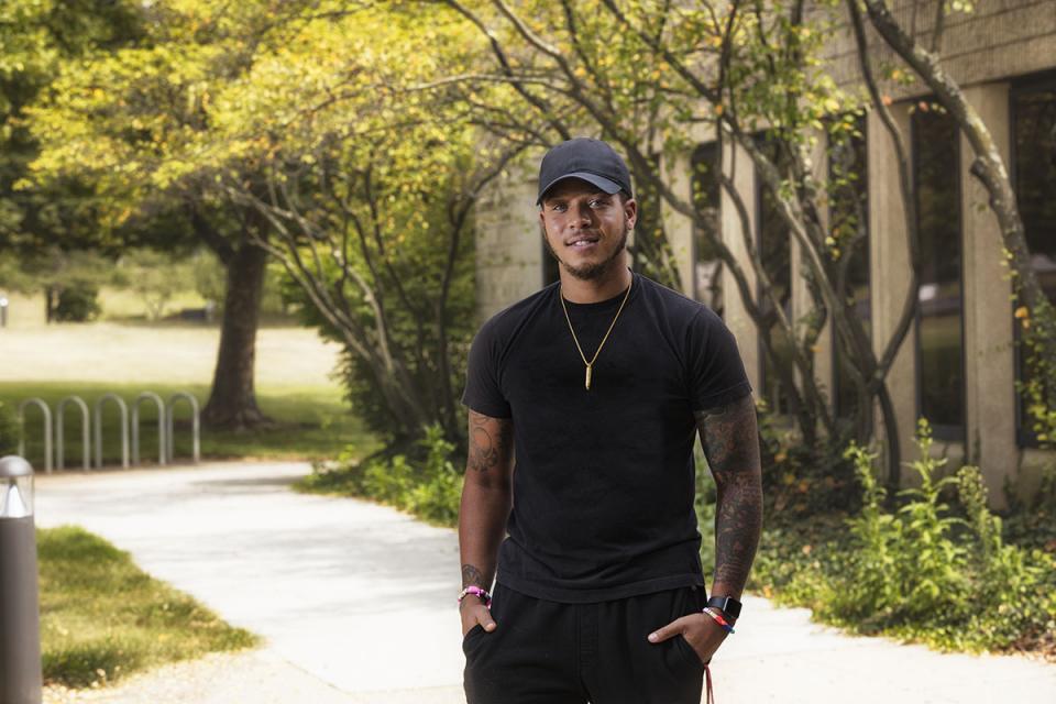 KJ standing outside