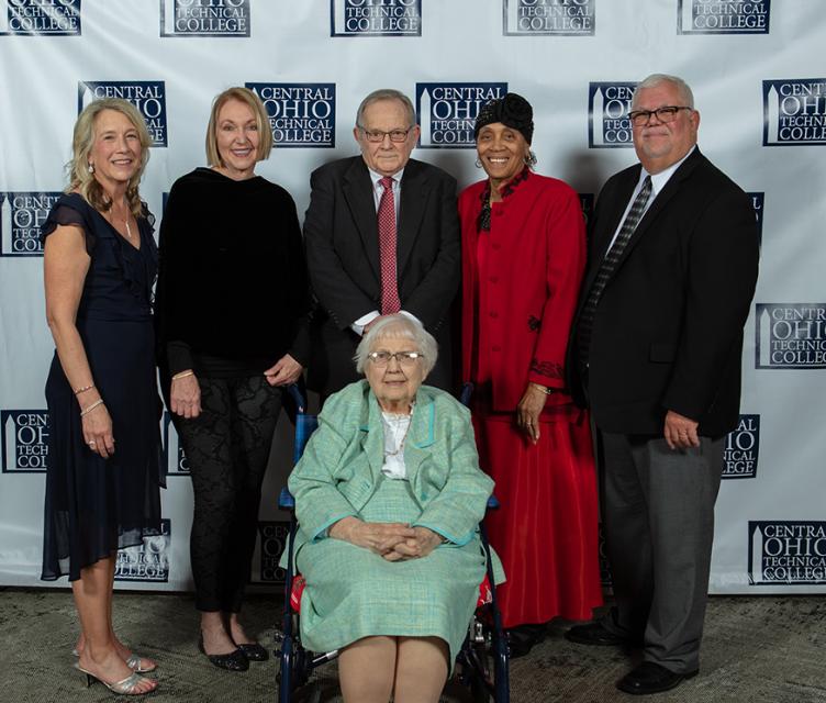 Legends of Loyalty award recipients standing in line. 