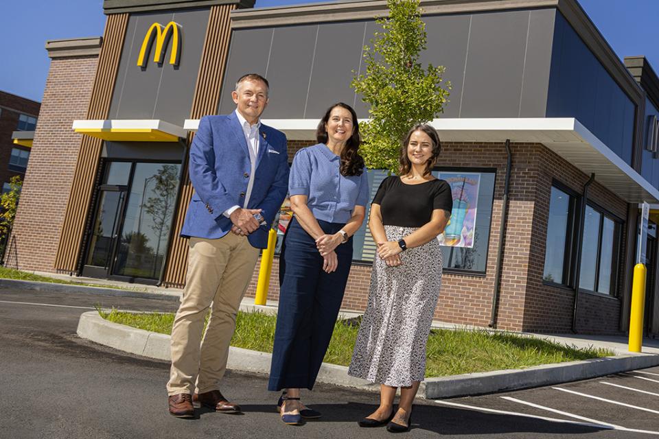 Brian and Jamie Mortellaro stand outside a McDonald's restaurant.