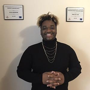 Young african-american person smiling at camera, Ohio State Newark student Sage Anderson