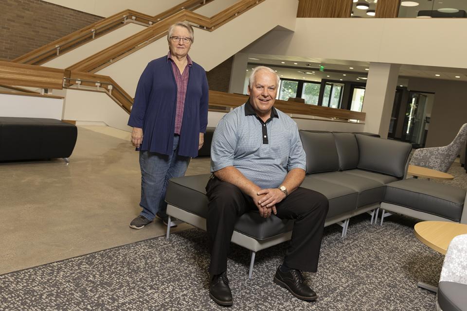 Portrait of Sandra Siegrist and Scott Wilson inside Hodges Hall of COTC's Newark campus.